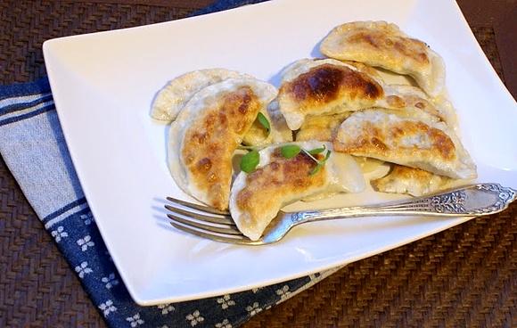 Pierogi z kapustą kiszoną i grzybami
