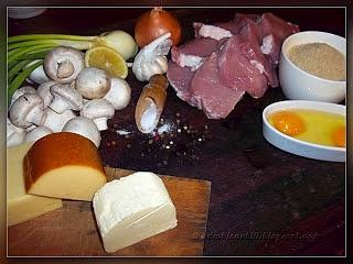 Duszone pieczarki w schabowych kieszeniach