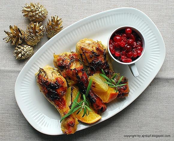 Kurczak pieczony w pomarańczach i rozmarynie z sosem żurawinowym