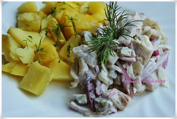 Śledzie w śmietanie z ziemniakami
