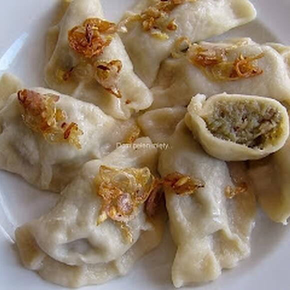 Pierogi z tartymi ziemniakami i z boczkiem